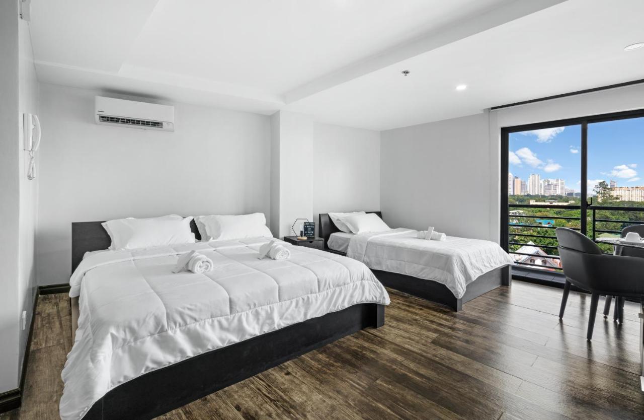 Espacio Hotel Тагуиг Екстериор снимка