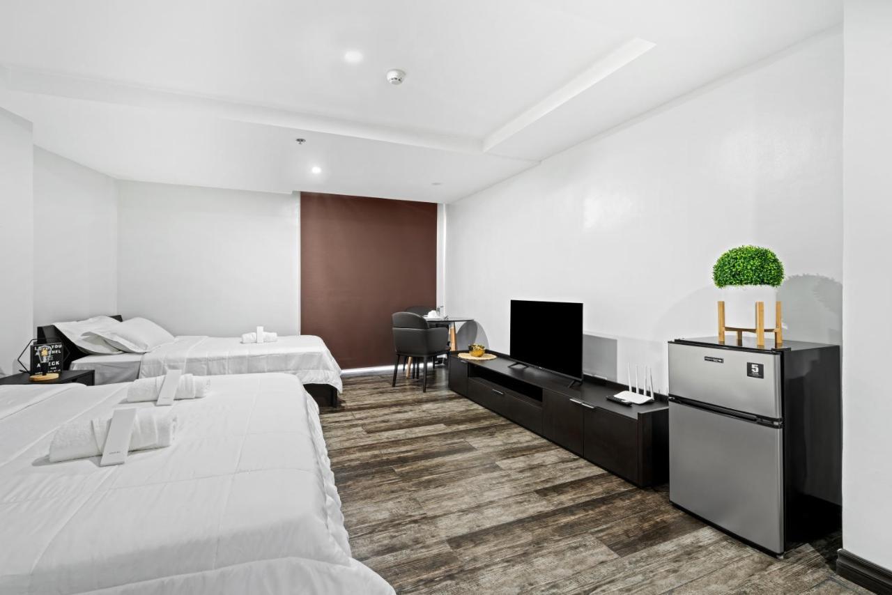 Espacio Hotel Тагуиг Екстериор снимка